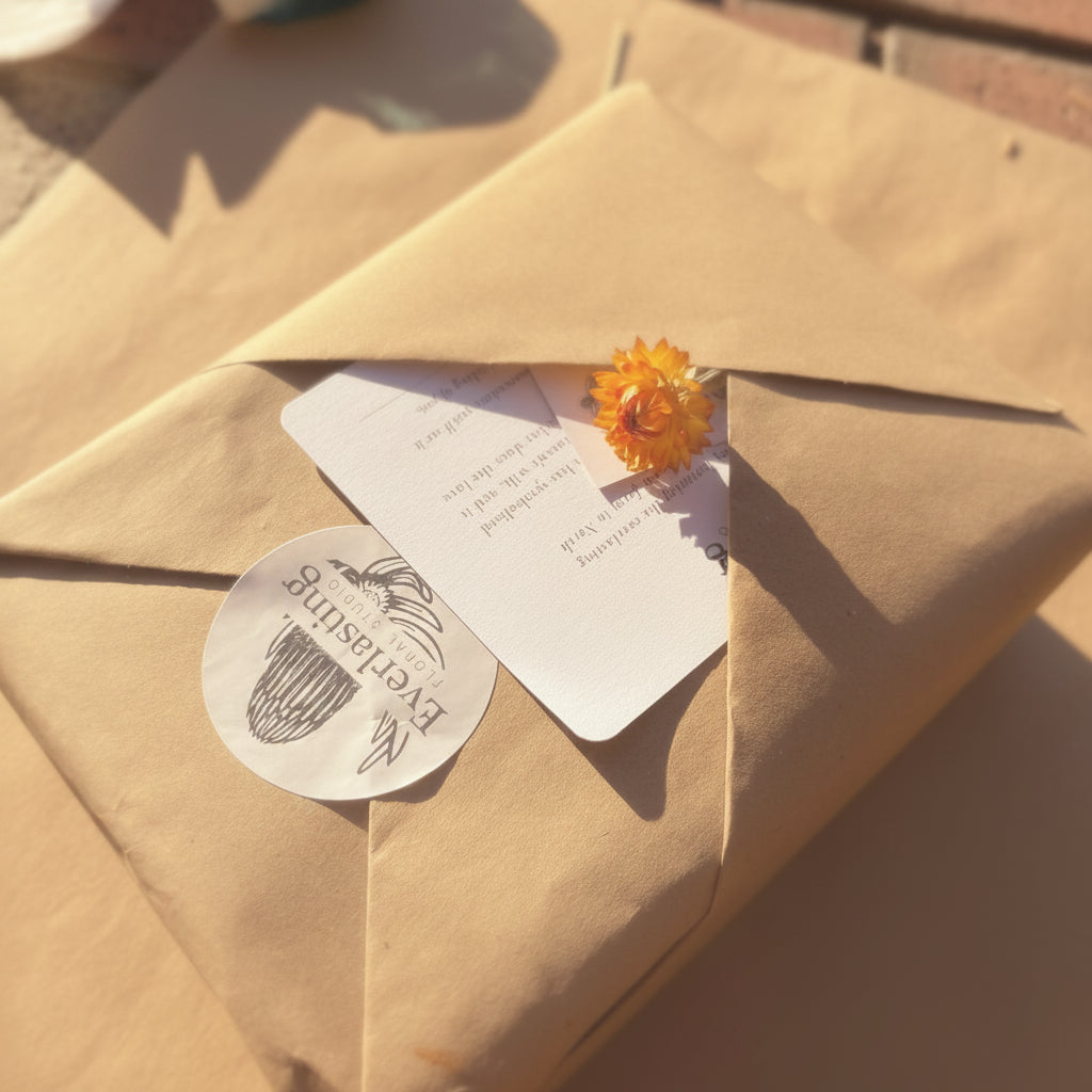 Dried flower posy gift box with handwritten card — gift wrapped and ready to send