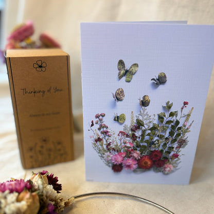 greting cad made with natural products. butterflies in everlasting daisies card