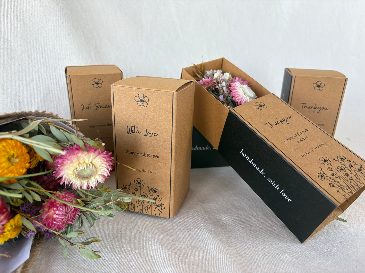grift box collection with dried flower posy