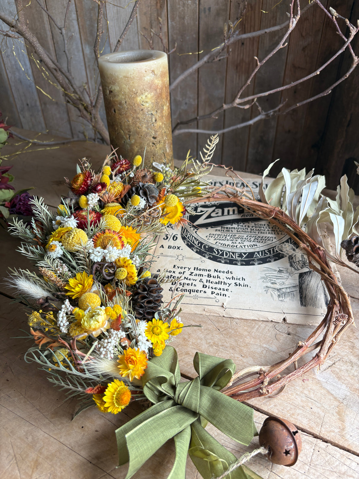 Close-up of dried banksia on a handmade Christmas wreath